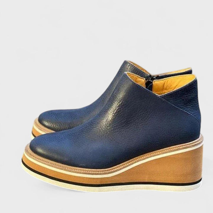 navy blue leather wedge ankle booties with tan platform sole