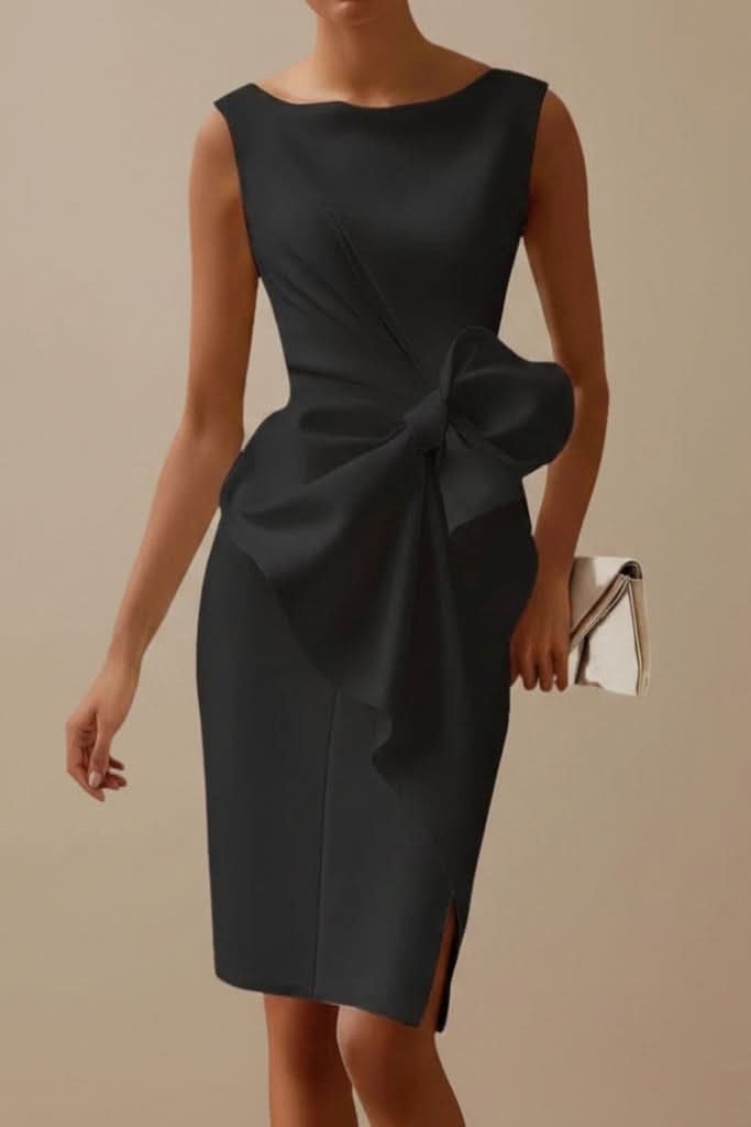 Charcoal sheath dress featuring draped bow and subtle front slit