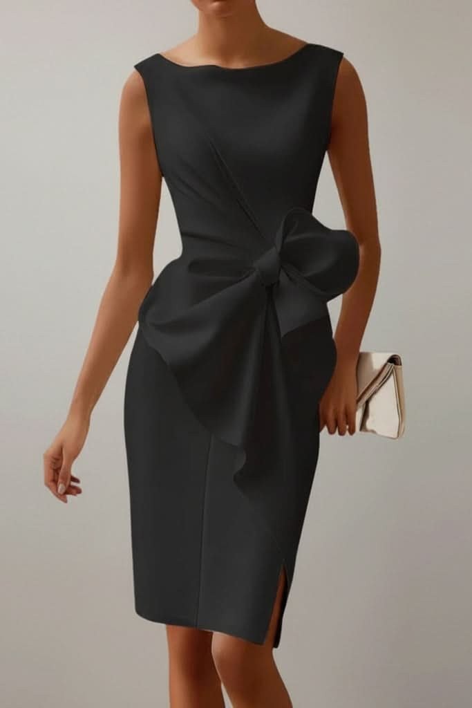 black sleeveless bodycon dress with oversized bow waist and slit detail