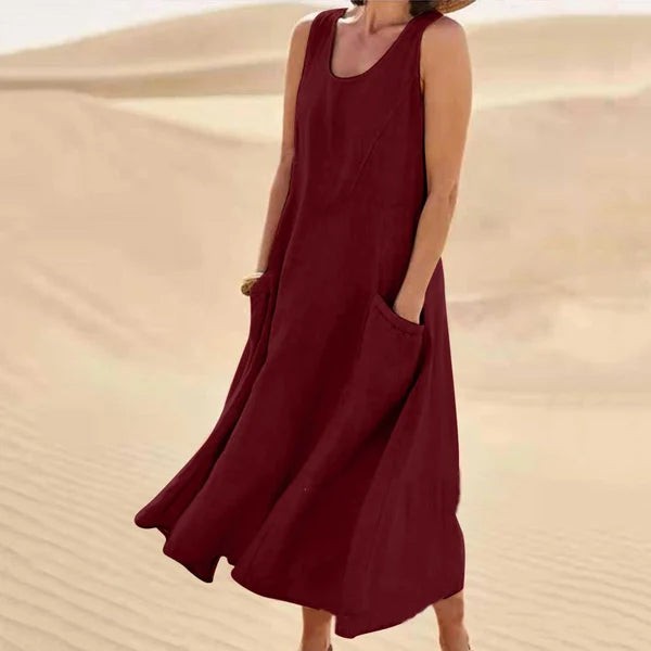 Burgundy sleeveless linen midi dress with relaxed pocket design