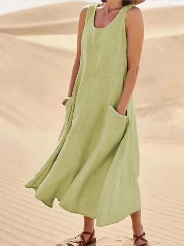 Sage green sleeveless linen midi dress with relaxed fit and pockets