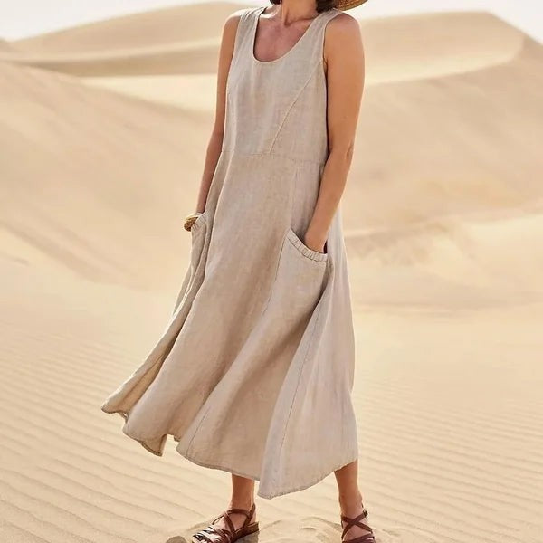 Beige linen sleeveless maxi dress with patch pockets, natural texture
