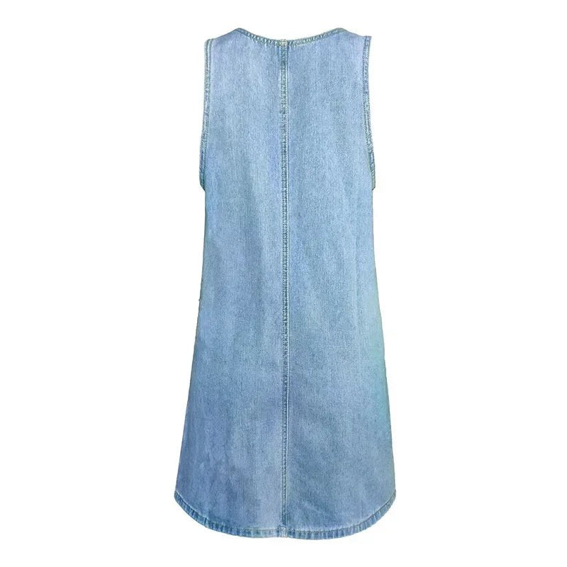 Back view of sleeveless denim shift dress with curved hem