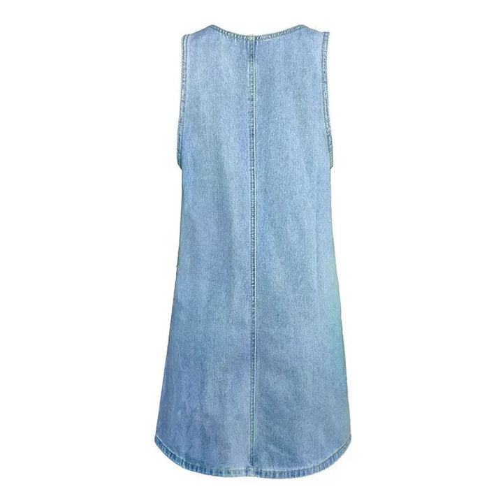 Back view of sleeveless denim shift dress with curved hem
