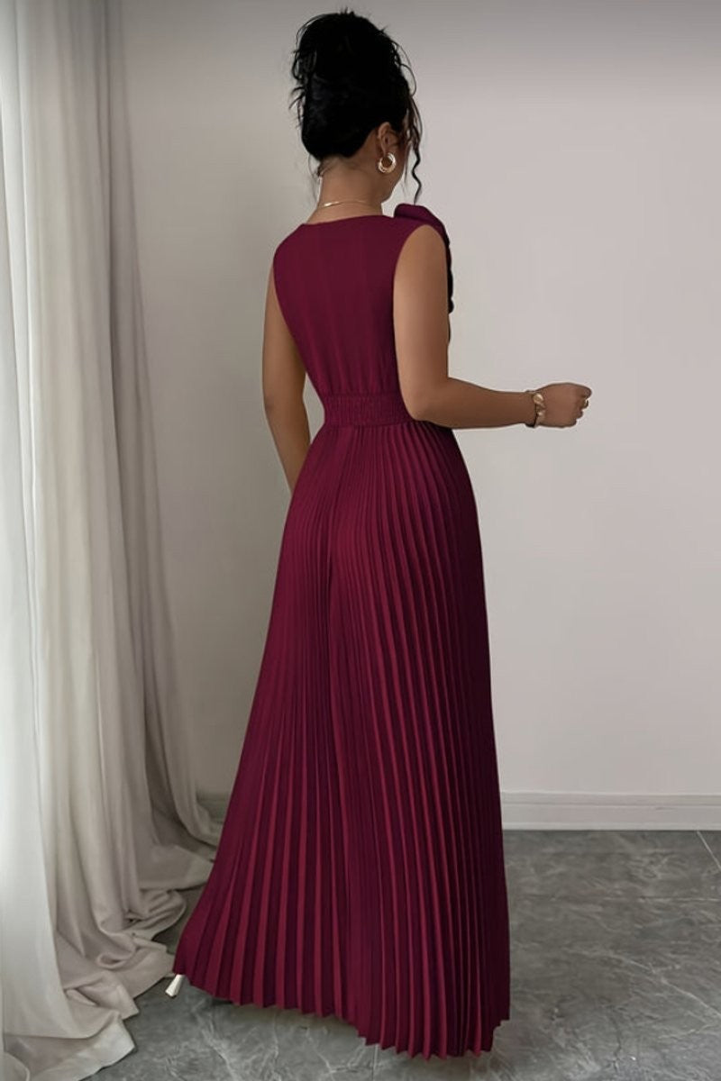 burgundy pleated maxi dress with shoulder bow, back view flowing silhouette