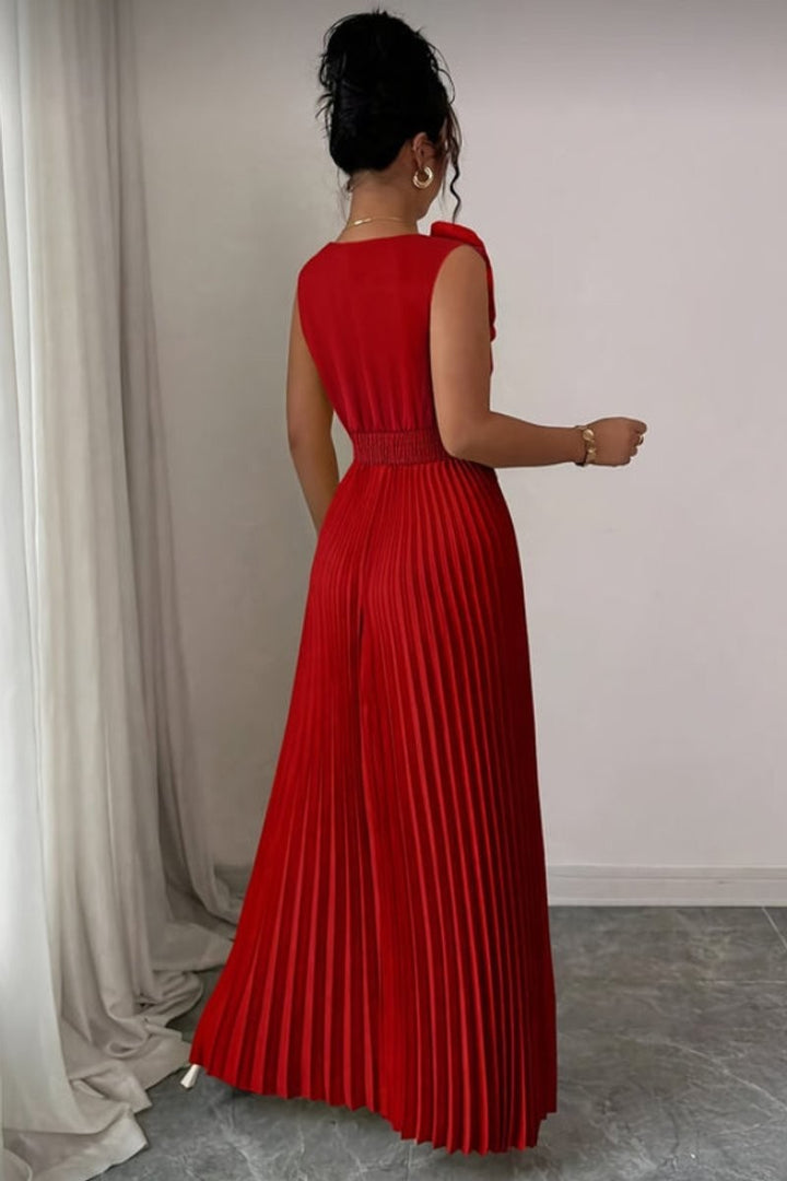 red sleeveless pleated maxi dress with shoulder bow, back view