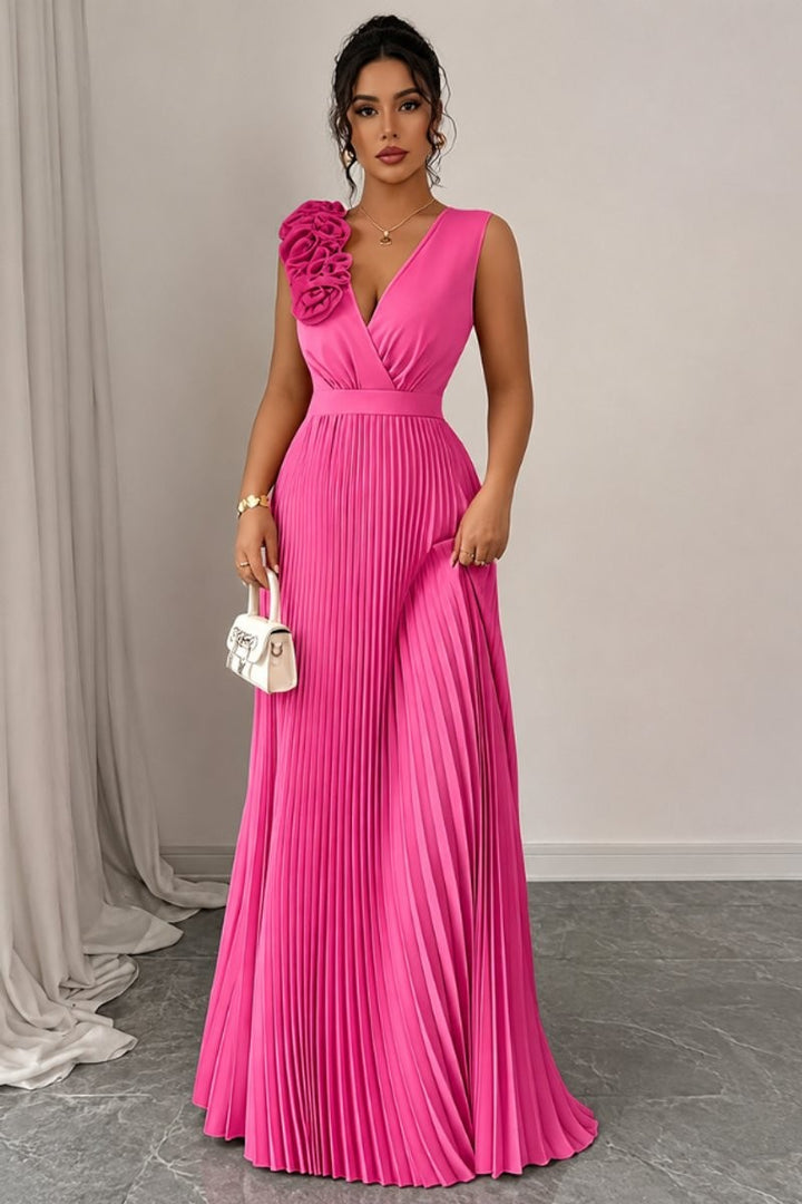 hot pink pleated A-line evening gown with floral shoulder applique