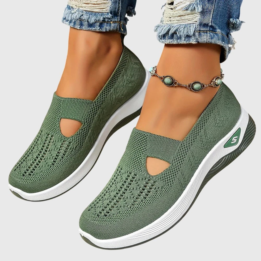 Olive green knit slip-on sneakers with cutout detail and white platform sole