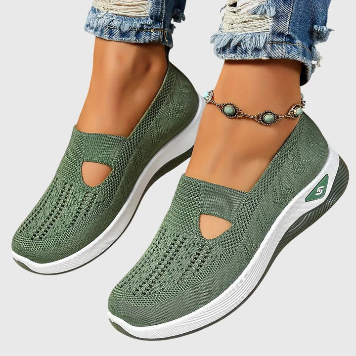 Olive green knit slip-on sneakers with cutout detail and white platform sole