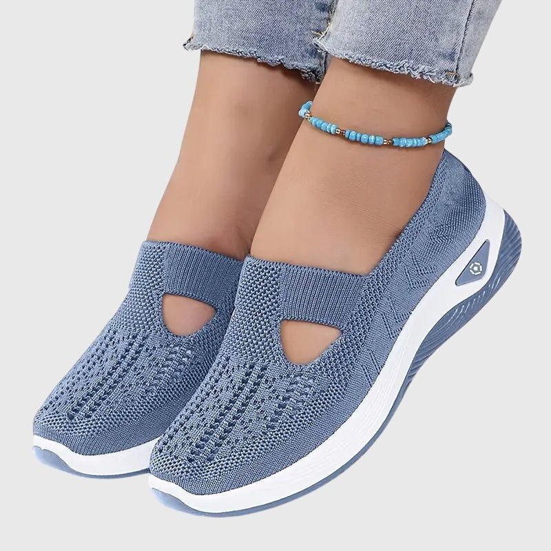 Dusty blue knit slip-on shoes with triangle cutout and thick white sole