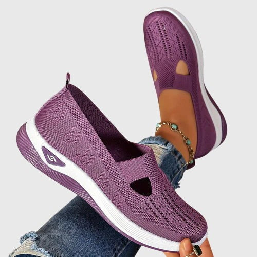 Plum knit slip-on sneaker displayed at angle with white chunky sole