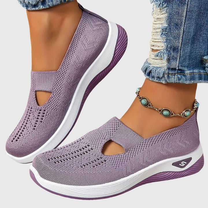 Mauve knit slip-on sneakers featuring cutout side and matching wedge sole