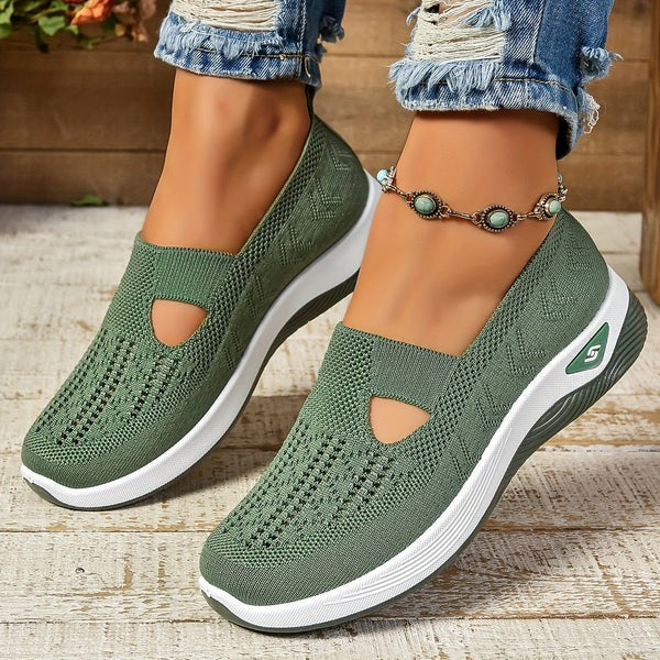 Olive green knit slip-on sneakers with cutout detail and platform sole