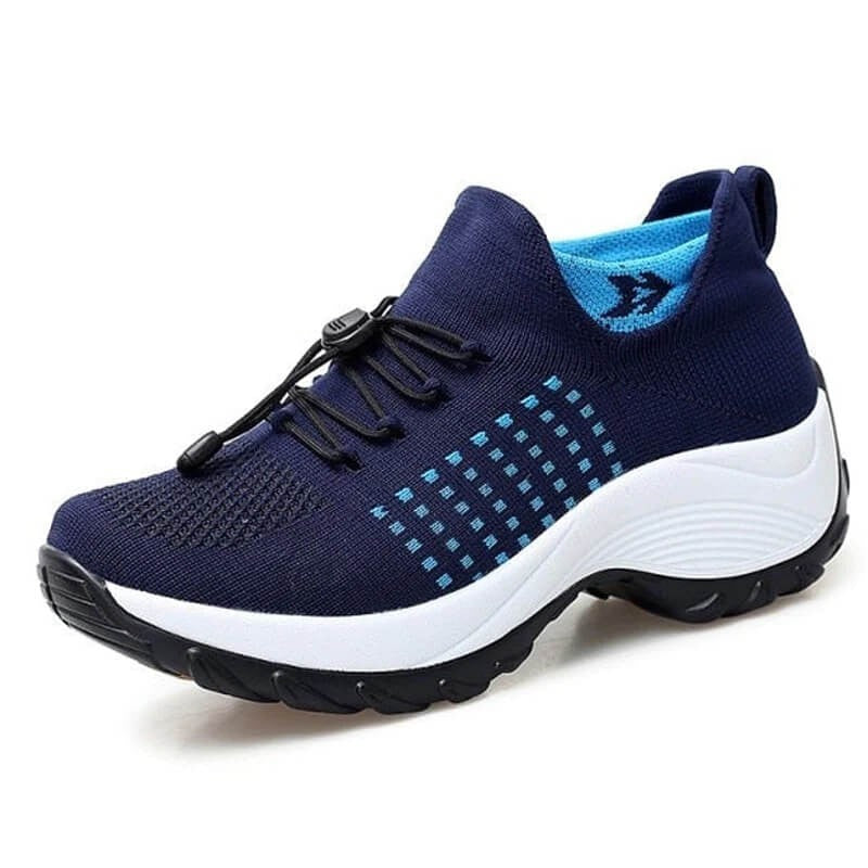 navy blue knit sneakers with light blue accents and thick platform sole