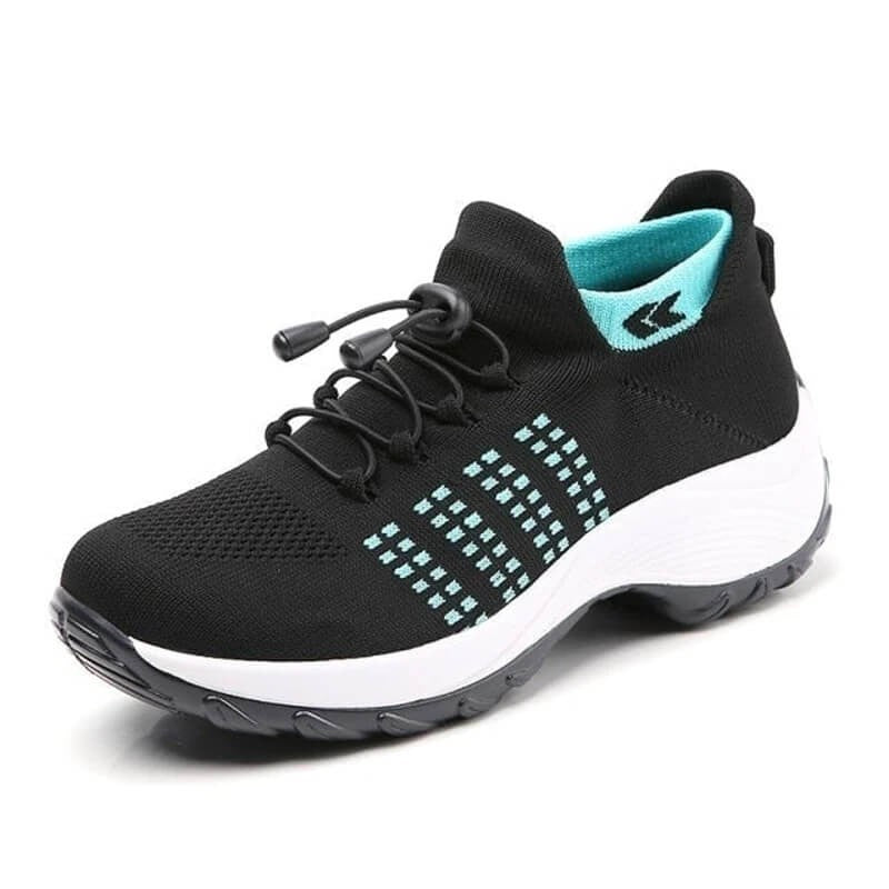black mesh sneakers featuring teal stripe details and chunky white midsole