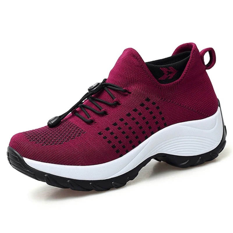 burgundy knit sneakers with black polka dot pattern and platform sole