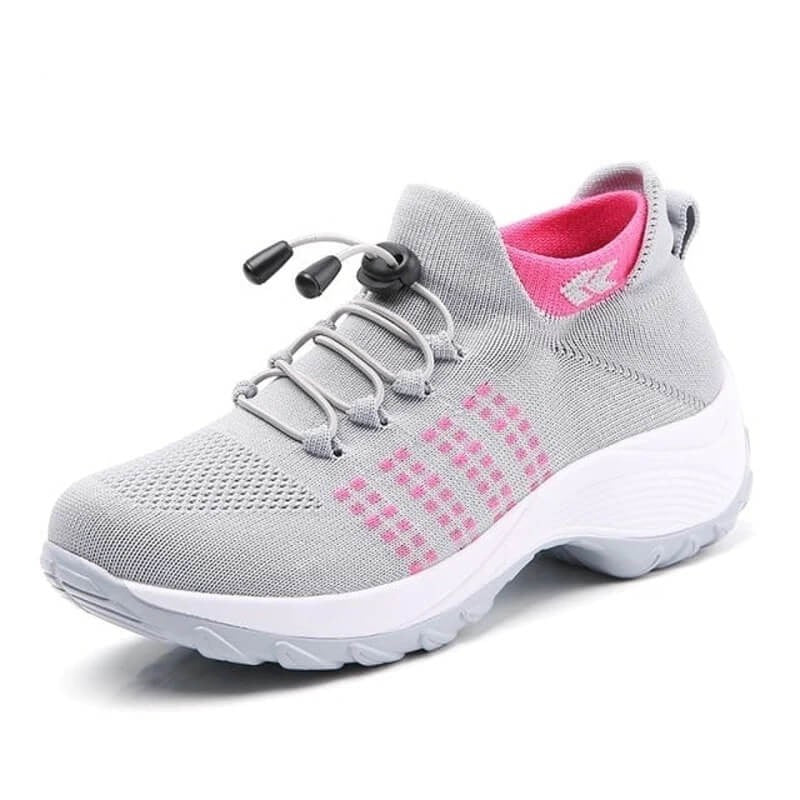 gray knit sneakers with hot pink stripe details and toggle laces