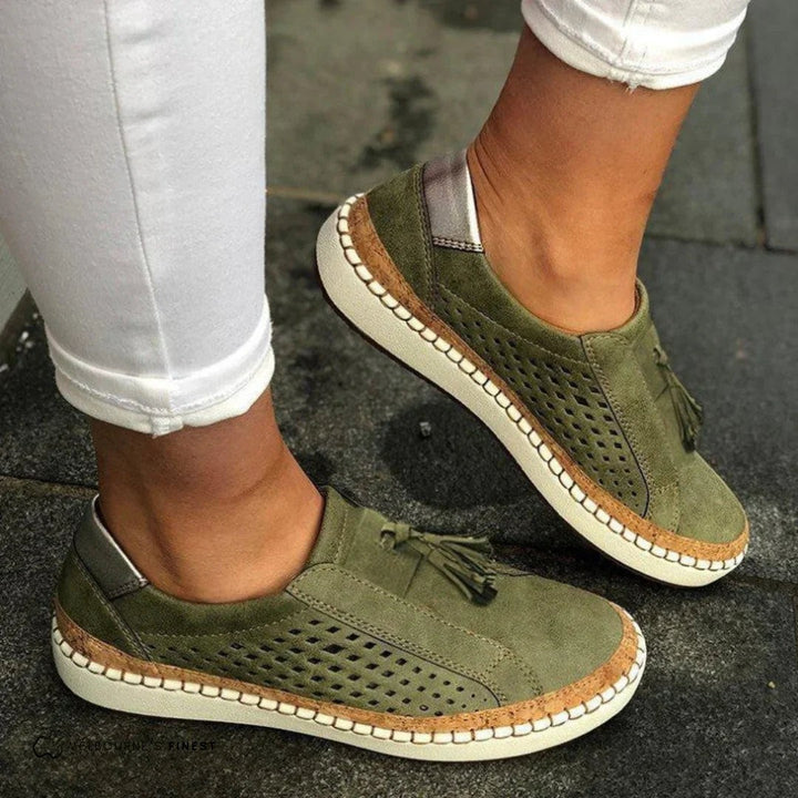 olive green suede slip-on sneakers with tassel detail and perforated sides