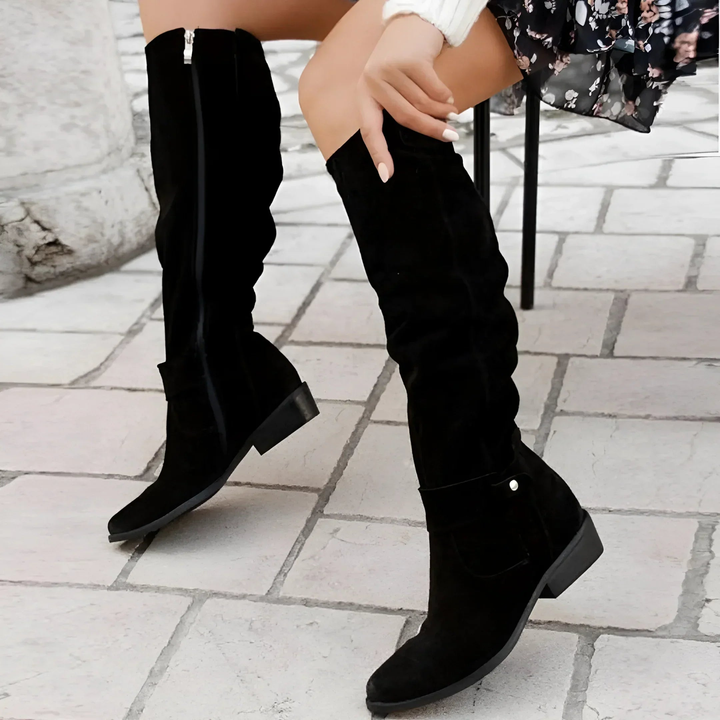 black suede knee-high boots with slouchy shaft and side zip