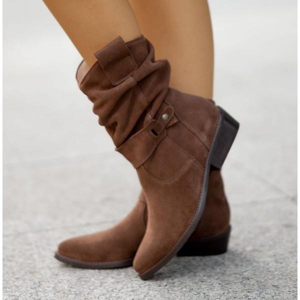 Brown suede slouchy ankle boots with buckle strap and low heel
