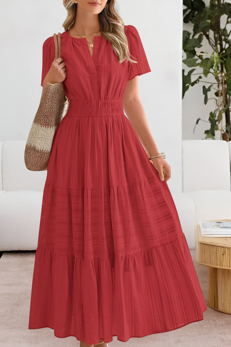 red tiered maxi dress with smocked waist and flutter sleeves