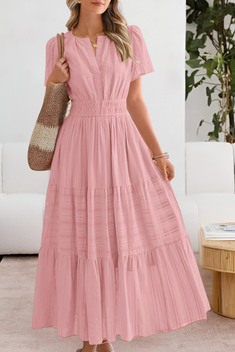 pink tiered maxi dress with smocked waist and short sleeves