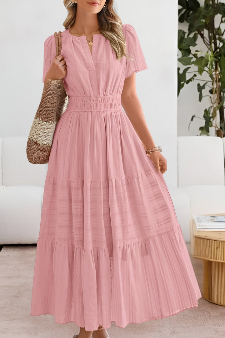 pink tiered maxi dress with smocked waist and short sleeves
