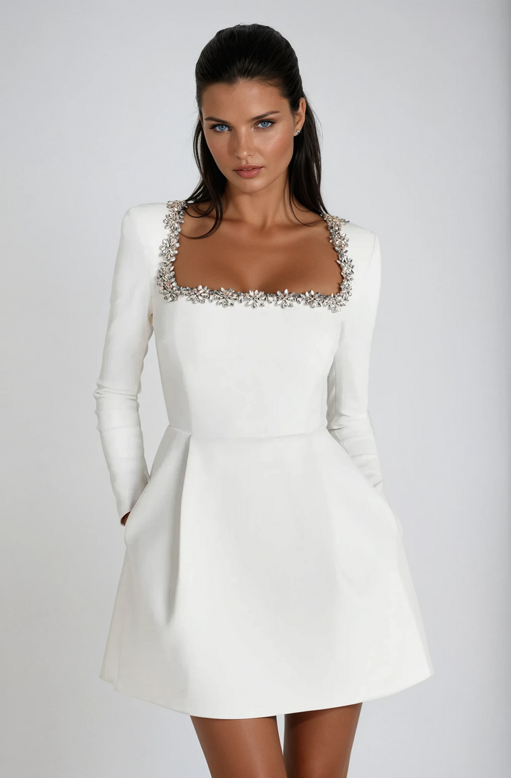 White velvet mini dress with crystal beaded square neckline detail