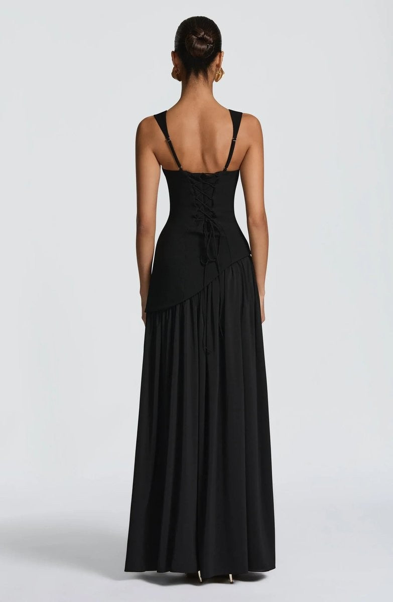 Black maxi dress back view showing lace-up corset detail and full skirt