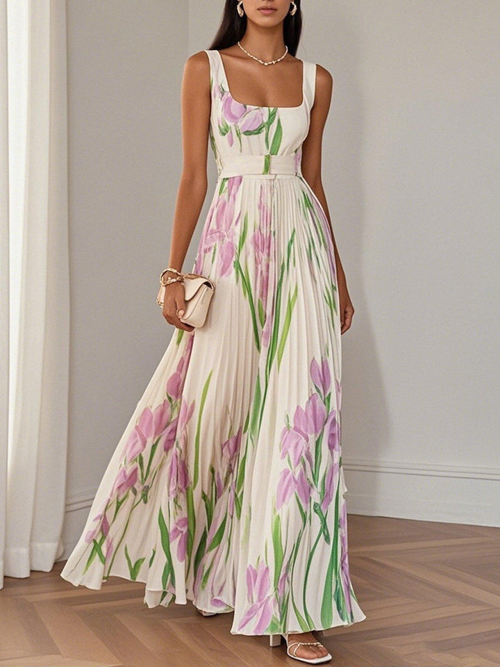 Sleeveless white pleated maxi dress with lilac floral print and belted waist