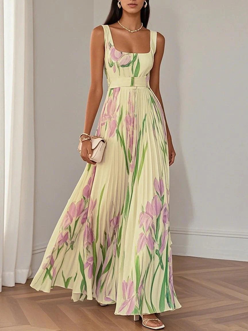 Pale yellow pleated maxi dress with lilac floral print and sleeveless bodice