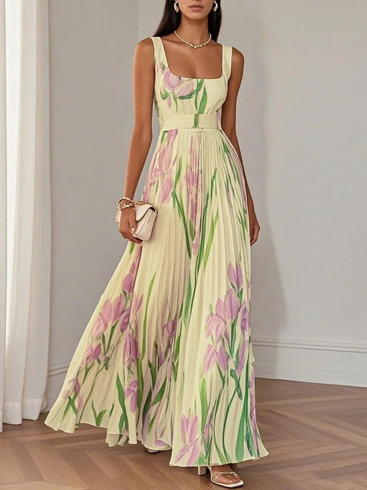 Pale yellow pleated maxi dress with lilac floral print and sleeveless bodice
