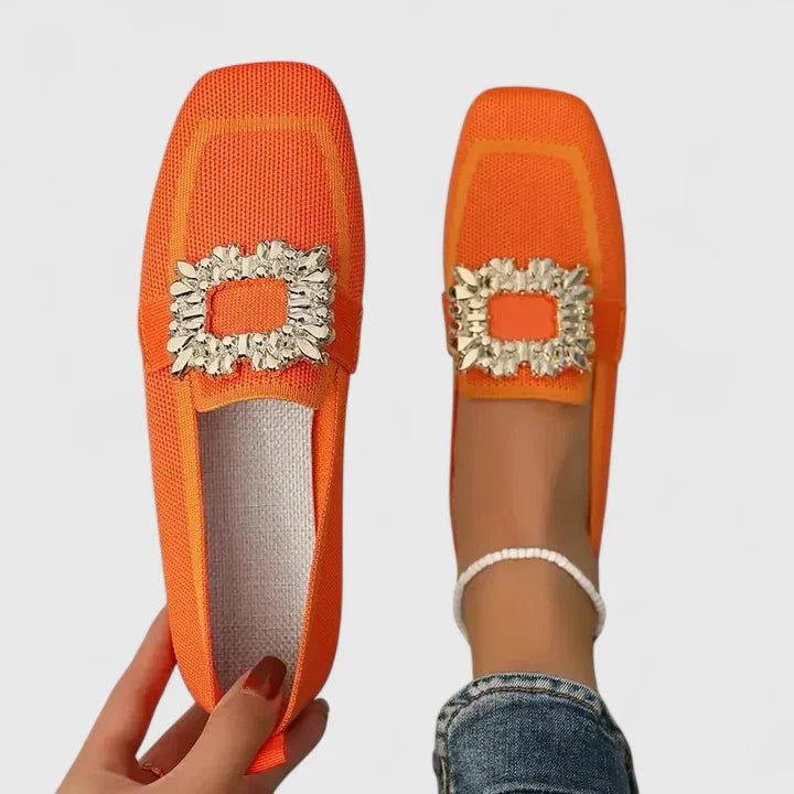 Bright orange knit flats with square toe and crystal buckle detail