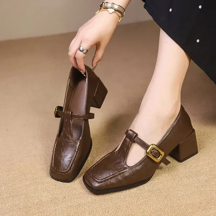 Brown leather Mary Jane heels with T-strap and gold buckle detail