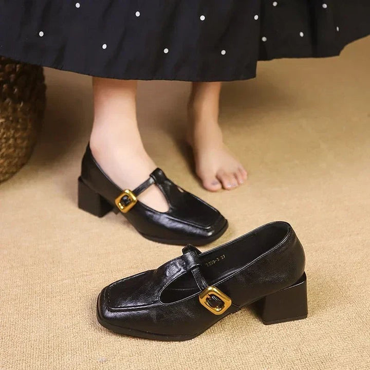 Black square toe Mary Jane pumps with chunky block heel and buckle