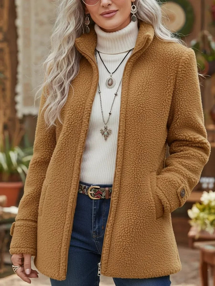 Camel teddy fleece coat featuring stand collar and front pockets