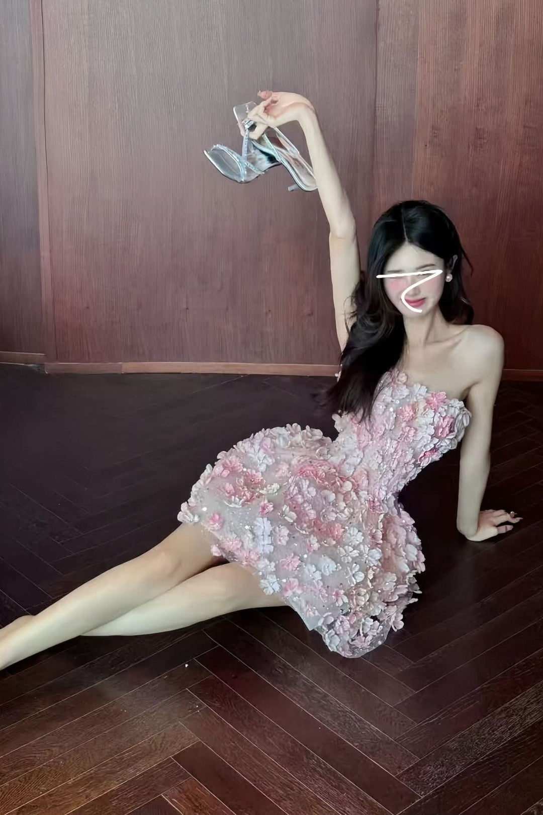 Sequined floral strapless mini dress shown with silver high heel sandals