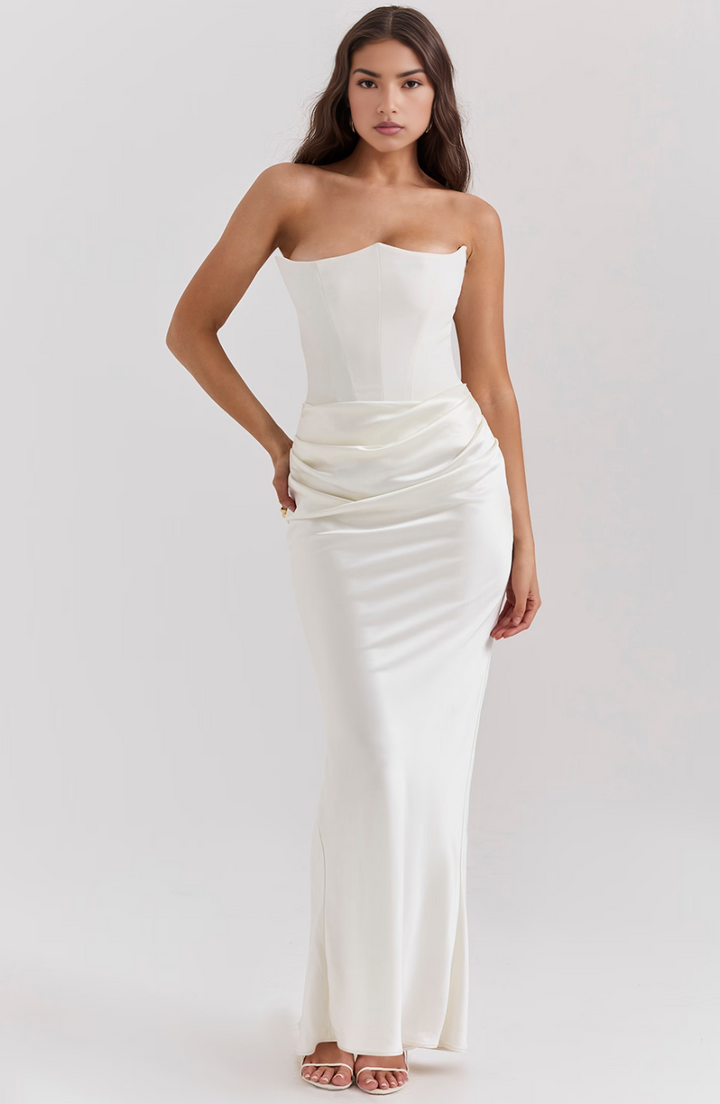 ivory strapless corset gown styled with hand in hair
