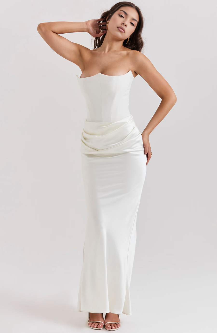 white satin strapless dress side profile with draped skirt