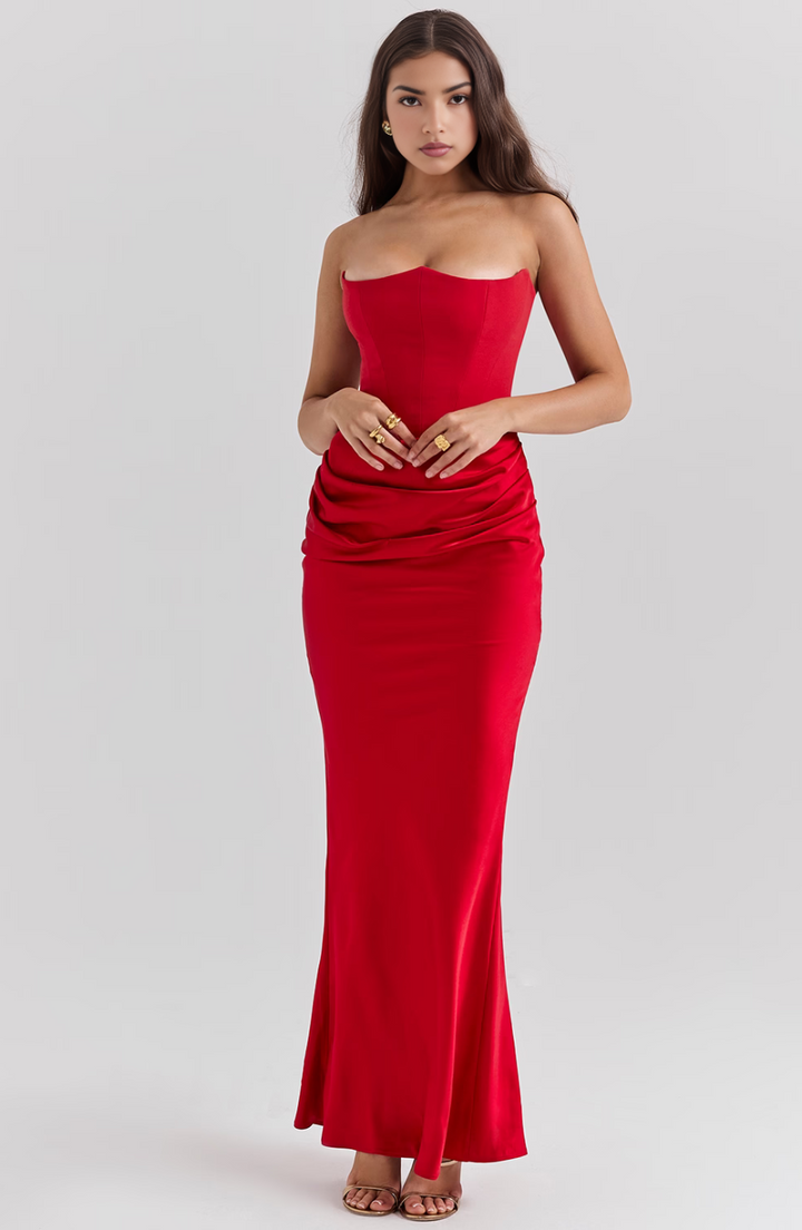 red satin strapless gown with draped waist detail
