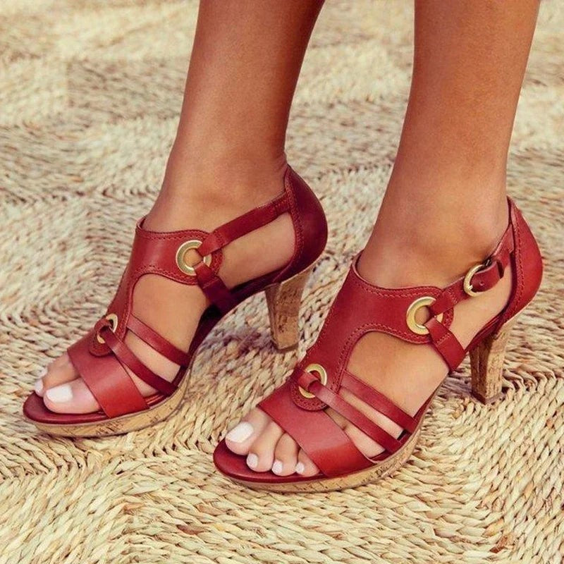 brick red leather T-strap sandals with gold hardware accents
