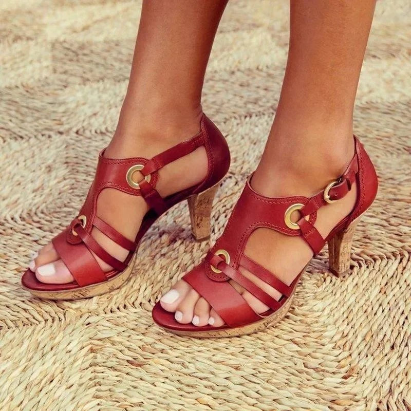 red leather strappy sandals with gold rings and cork platform heel