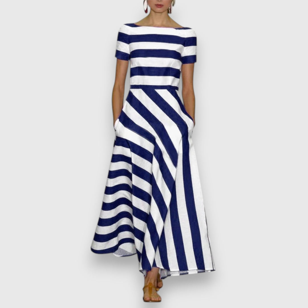 Navy and white striped maxi dress with short sleeves and asymmetric hem