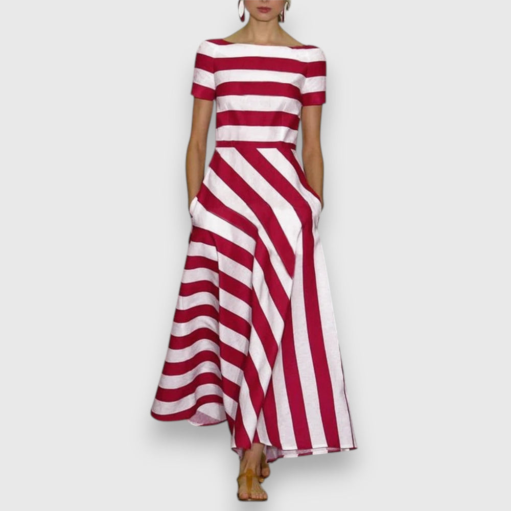 Red and white striped maxi dress featuring short sleeves and flowing skirt