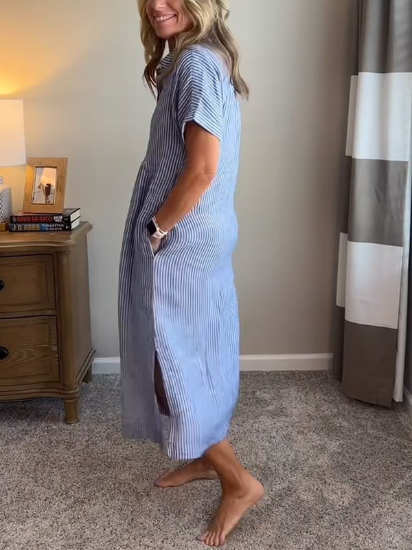 Side view of blue striped shirt dress showing side slit and hem