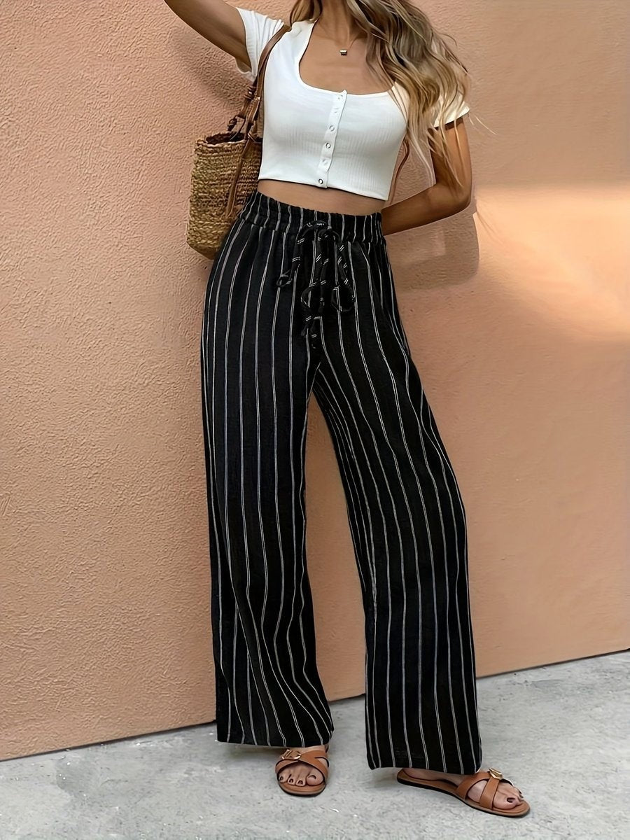Black and white striped high-waist wide-leg pants with drawstring, front view