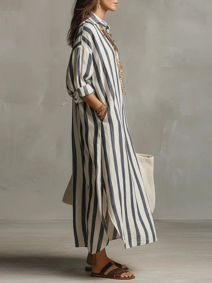 Side view of oversized striped linen maxi dress with front slit