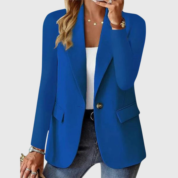 Cobalt blue single-button blazer with tailored notch lapel and flap pockets