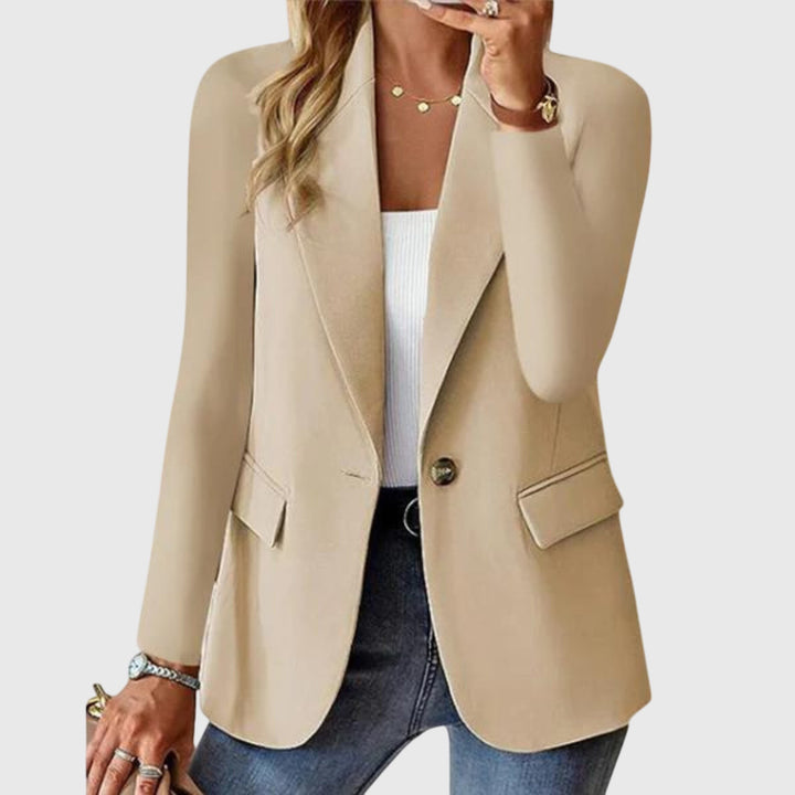 Beige structured blazer with single button fastening and flap pockets