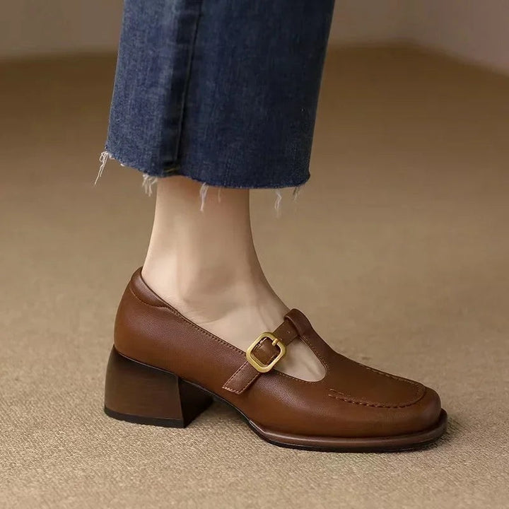 Brown leather Mary Jane shoe with buckle strap and stacked block heel